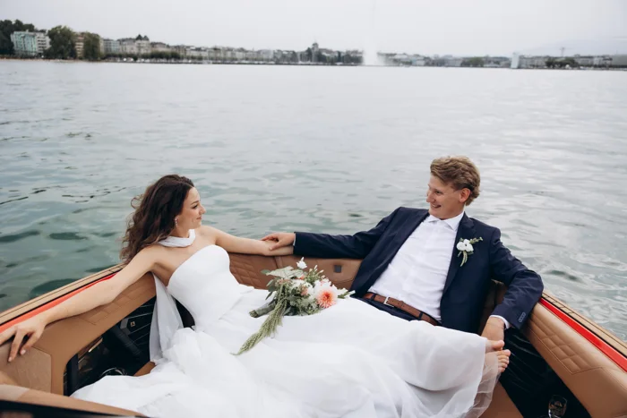 Solenne and Axel aboard a boat on Lake Geneva