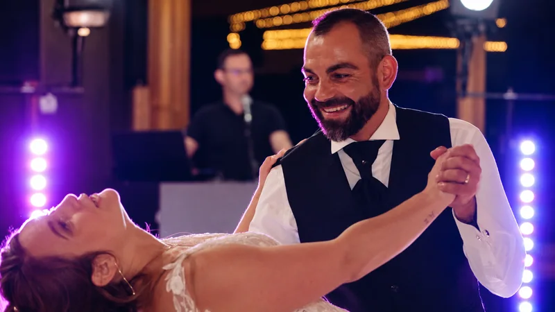 Tiphaine and Nicola laughing during their first dance